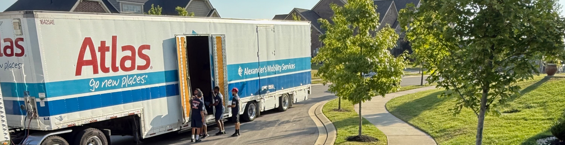 A moving truck unloading on a street in Ladd Park, Franklin, Tennessee